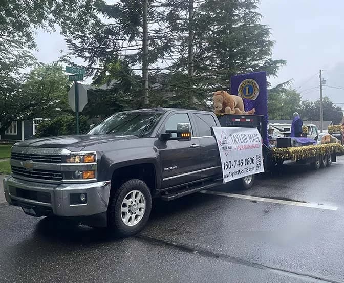 Taylor Made Truck Driving School community parade float